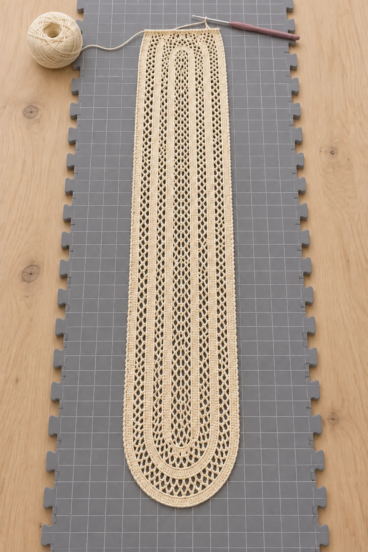 Long ivory oval filet crochet center with central diamond lattice and seven solid lengthwise bands